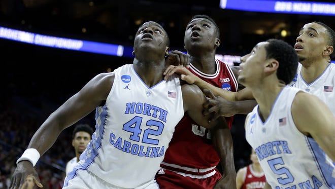 Hoosiers center Thomas Bryant (31) fights for position against Tar Heels forward Joel James (42) at the Wells Fargo Center on March 25, 2016.