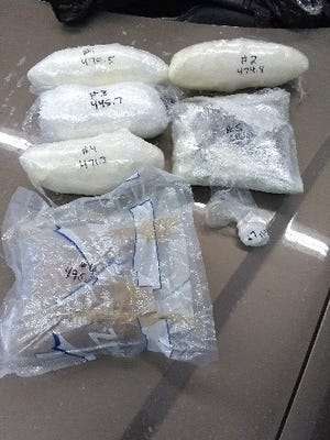 Drugs seized in meth arrest.