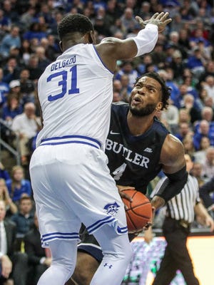 Butler Bulldogs forward Tyler Wideman (4) drives to the basket as Seton Hall Pirates center Angel Delgado (31) defends during the first half at Prudential Center.
