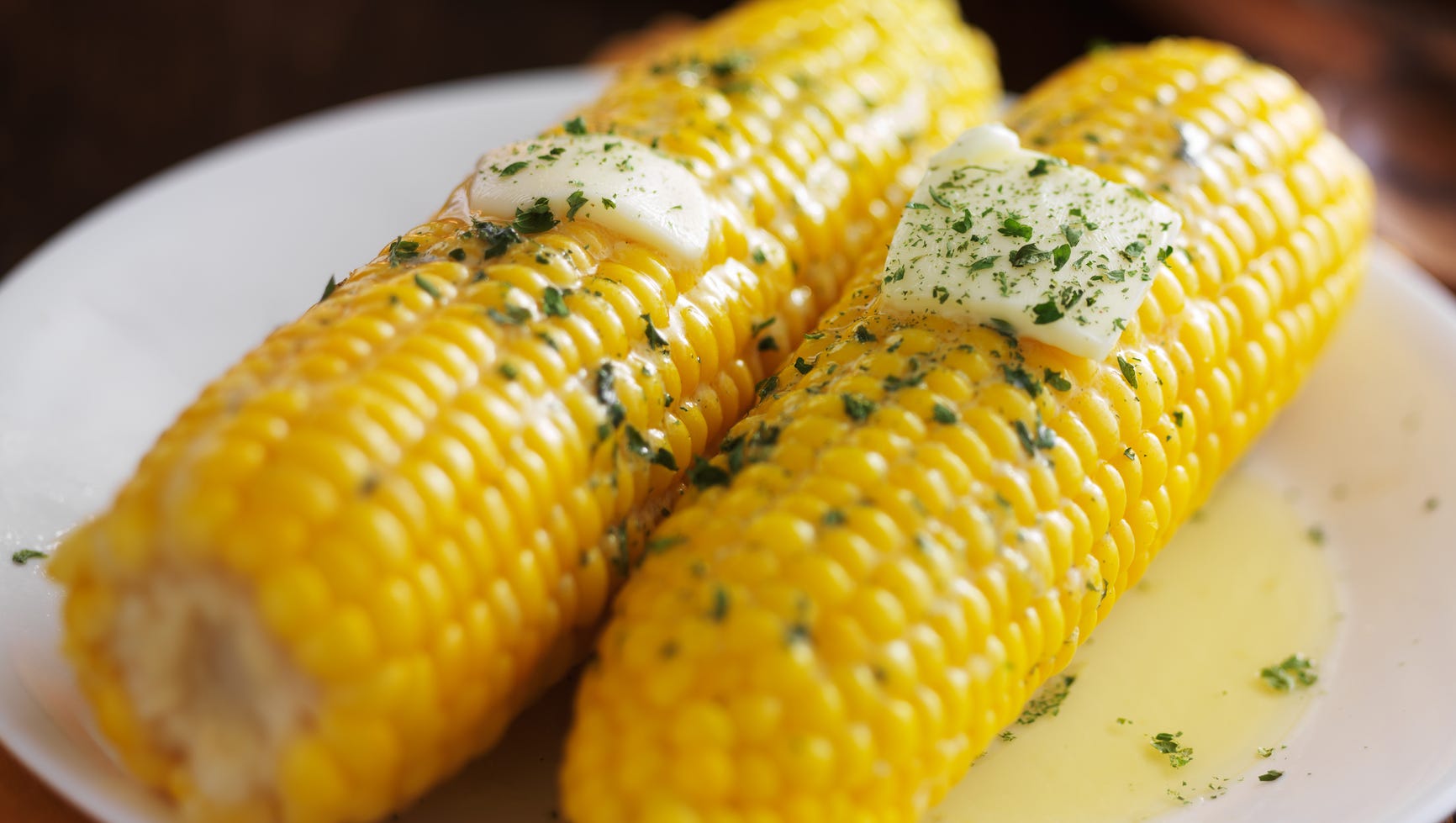 The Best Way To Cook Corn On The Cob According To Alex Guarnaschelli