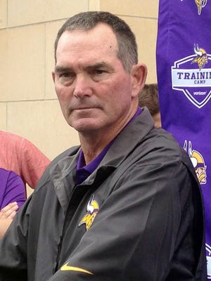 Minnesota Vikings head coach Mike Ziimmer listens to a question from the media Thursday in Mankato. The Vikings have given Zimmer a contract extension.