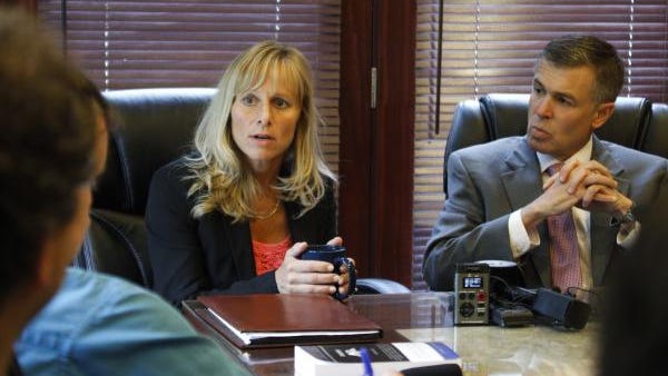 "I'm going to go back and be a mom this weekend, and spend time with my family," former Rep. Cindy Gamrat, said at a press conference in her attorney Mike Nichols East Lansing office September 11, 2015.