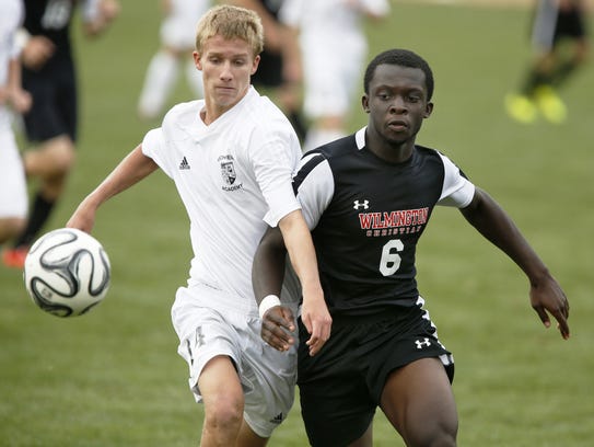 Archmere's Mark Dombroski (left) and Wilmington Christian's Darrell Yirenkyi go after the ball in a 2014 game. Dombroski died in March in Bermuda.