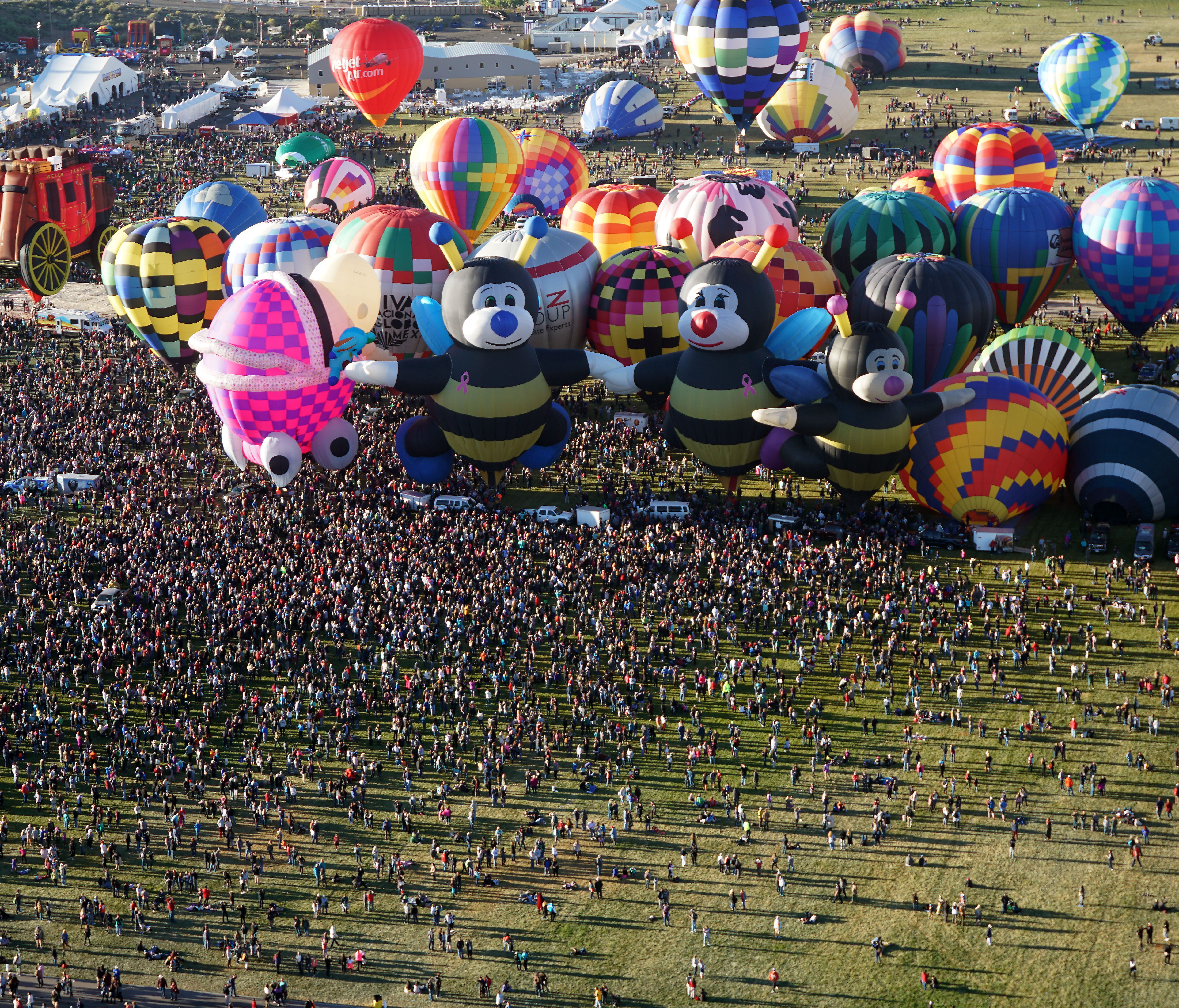 A massive crowd gathers to watch the morning mass ascension of balloons during the 2017 Albuquerque International Balloon Fiesta on Saturday, Oct. 14, 2017.         