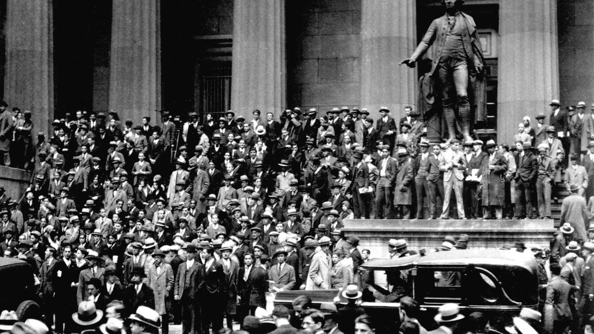   People gather across the street from the New York Stock Exchange in New York Oct. 24, 1929. Thousands of investors lost their savings in the worst stock market crash in Wall Street history. The Great Depression followed.   