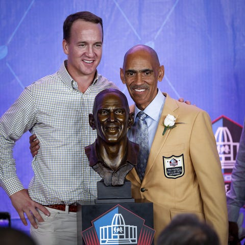 Former Indianapolis Colts coach Tony Dungy poses w