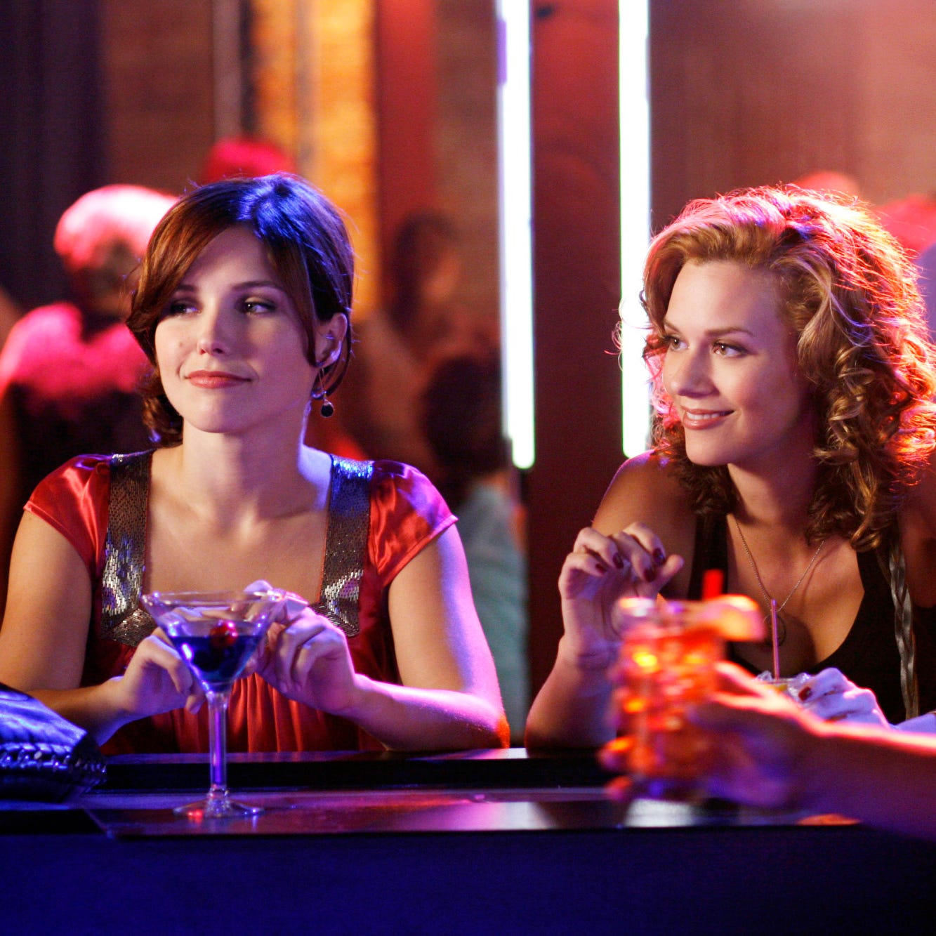 Sophia Bush as Brooke and Hilarie Burton as Peyton Sawyer in 'One Tree Hill.'