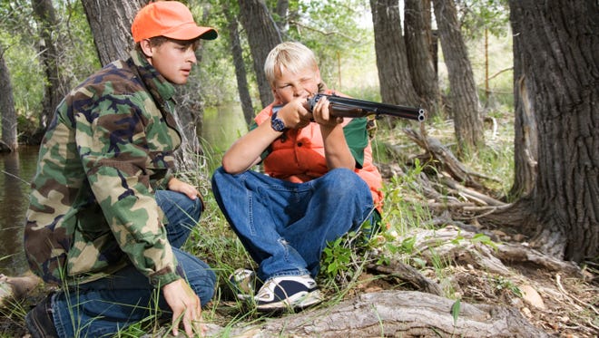 Two boys hunting