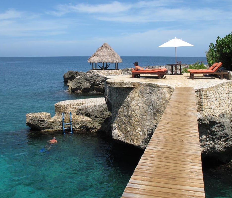 Tensing Pen Resort has a dramatic setting perched on limestone cliffs overlooking the ocean.