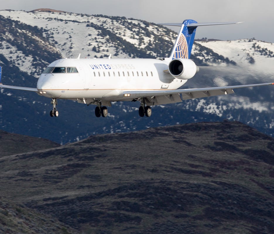 This file photo from 2016 shows a SkyWest-operated Bombardier CRJ-200 lands at Reno-Tahoe Airport under the United Express brand.