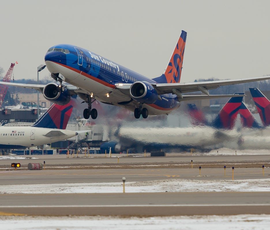A Sun Country Boeing 737 takes off from Minneapolis St-Paul International Airport in January, 2017.