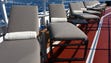 More lounge chairs are located one deck up from the