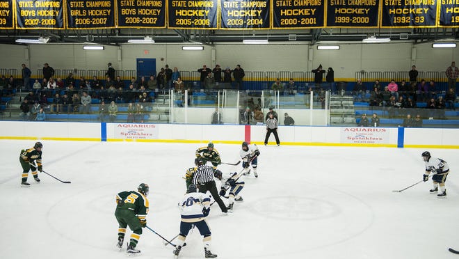 Essex and BFA face off during the boys hockey game between the BFA-St. Albans Bobwhites and the Essex Hornets at the Essex Skating Facility on Dec. 21, 2016 in Essex.