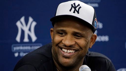 New York Yankees pitcher CC Sabathia smiles during a news conference after a spring training baseball workout Friday, Feb. 19, 2016, in Tampa, Fla. (AP Photo/Chris O'Meara) 