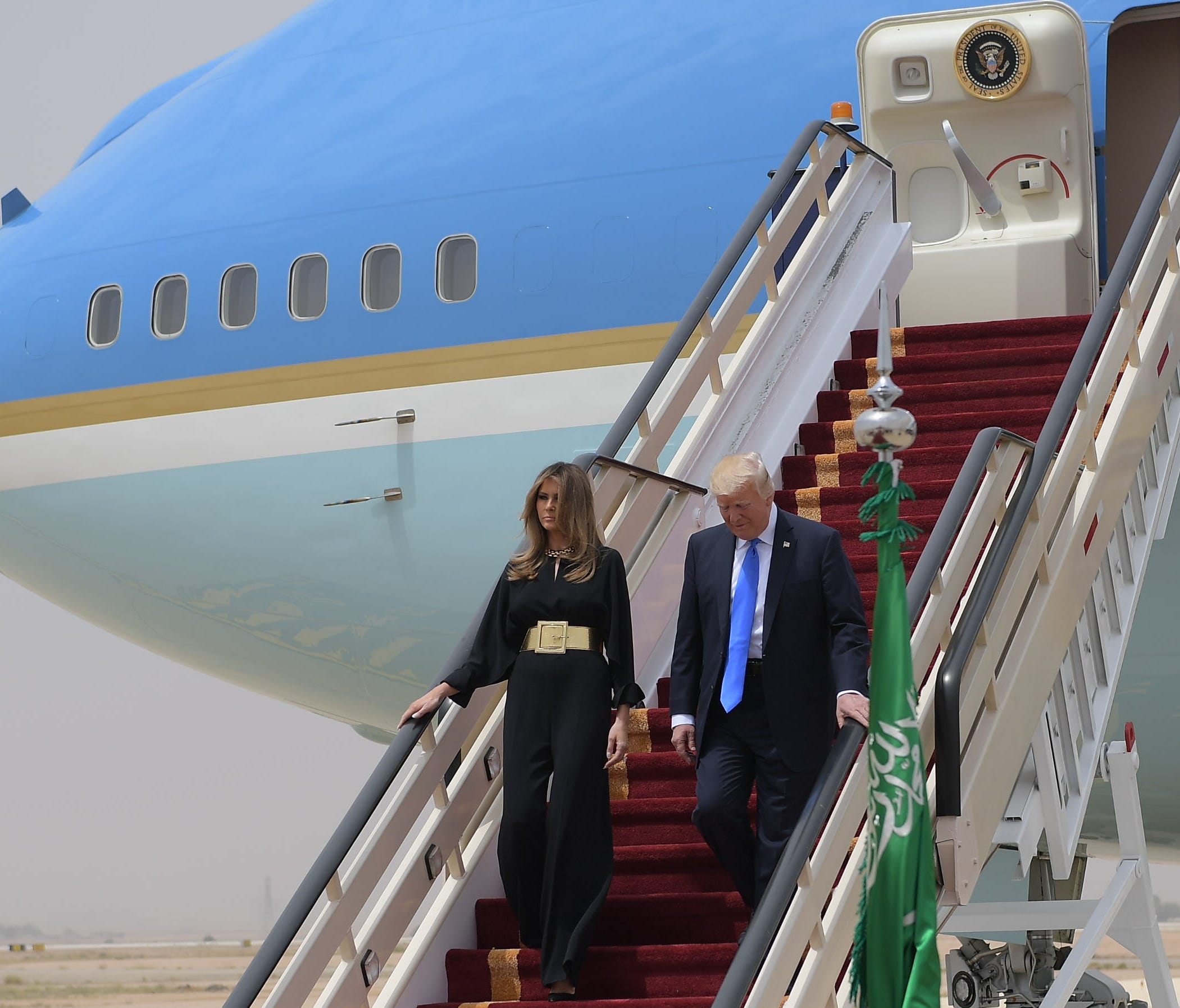 President Trump and First Lady Melania Trump step off Air Force One upon arrival at King Khalid International Airport in Riyadh on Saturday.