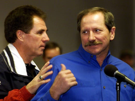 Dale Earnhardt, right, jokes with Darrell Waltrip during