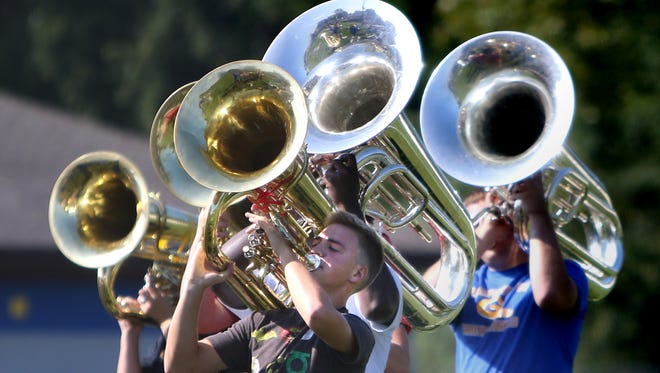 The tuba section of the Germantown Marching Band performs for guests to a groundbreak ceremony on Aug. 30 for the expansion of Germantown High School. They will also be rousing up school spirit at Germantown's football game vs Wauwatosa West Friday, Sept. 22.