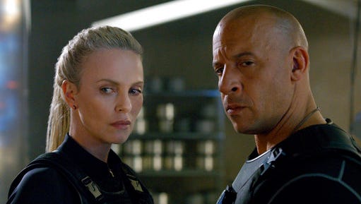 Charlize Theron, left, and Vin Diesel star in "The Fate of the Furious."