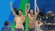 Michael Phelps (USA) and Caeleb Dressel (USA) celebrate