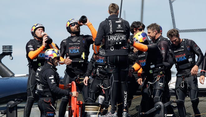 Oracle Team USA celebrates its second straight America's Cup title.