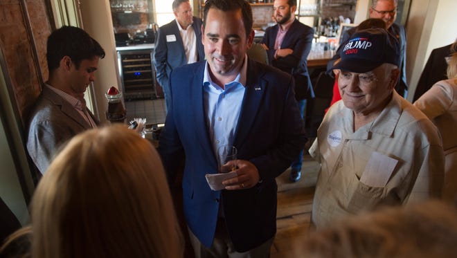 Gubernatorial candidate Walker Stapleton talks with supporters at The Farmhouse at Jessup Farm during a campaign event on Friday, July 13, 2018. 