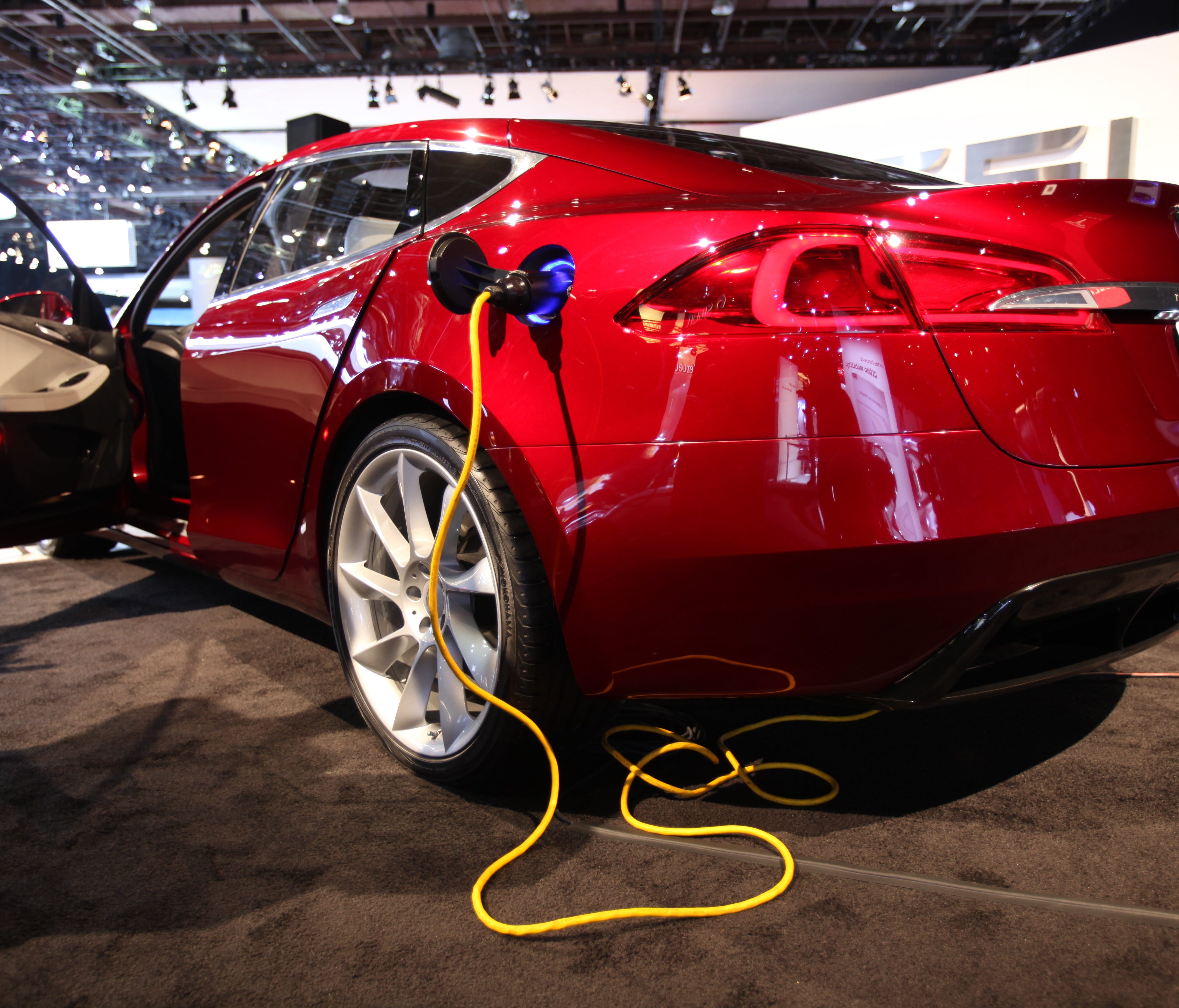 The Tesla Model S sedan has up to 300 miles range per charge and is hoped to be available to the public by 2012, shown at the North American International Auto Show at Cobo Center, Detroit on Jan. 12, 2010.   Tesla is auctioning its 1000th Roadster w