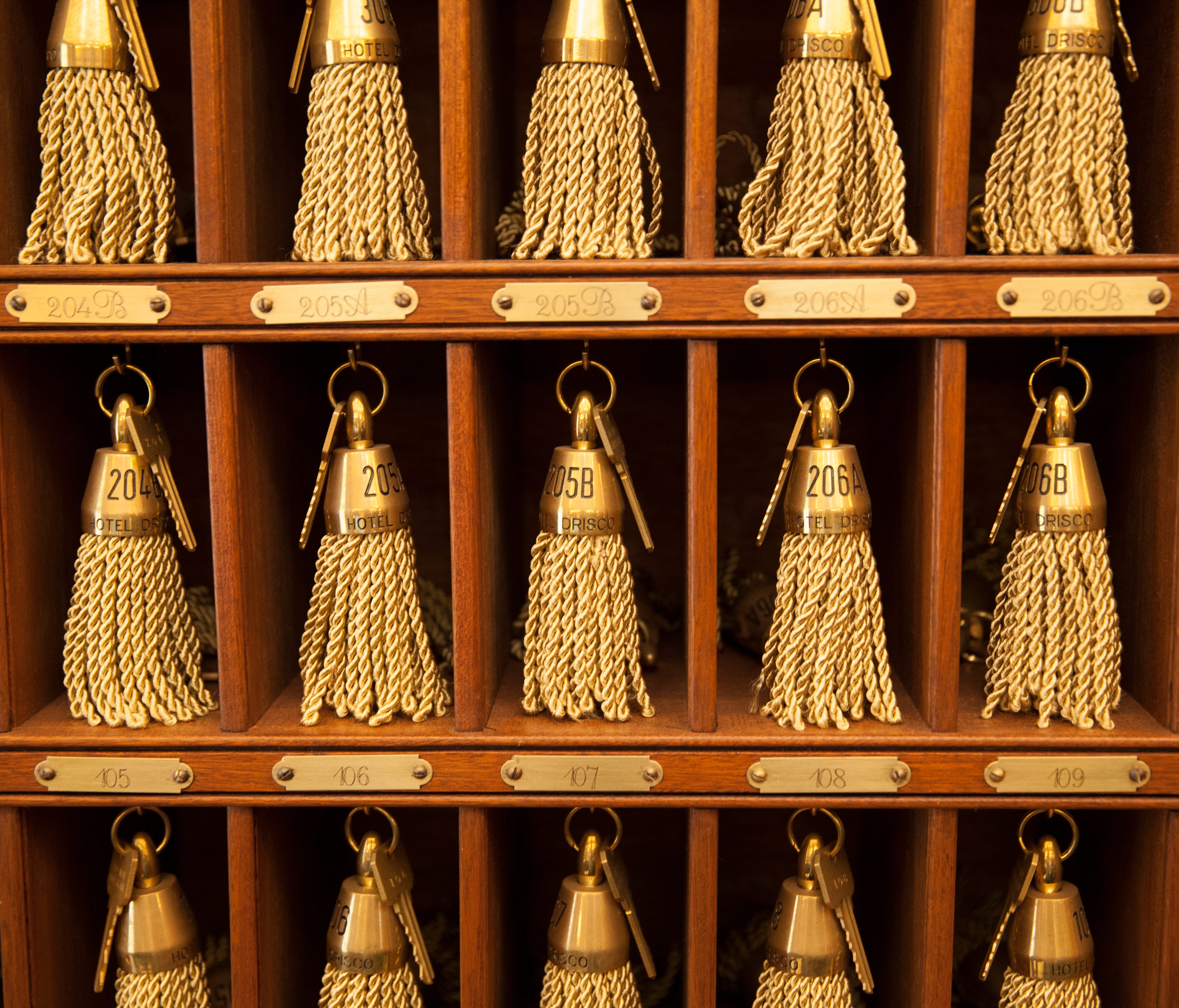 The Hotel Drisco in San Francisco proudly displays its metal keys in their cubbyholes at the front desk.