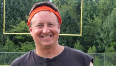 Fairview football coach Chris Hughes, 50, is quarterback of the Mean Machine flag football team in the off season. He has led Mean Machine to the final eight of the American Flag Football League Tournament with the chance to win $1 million.