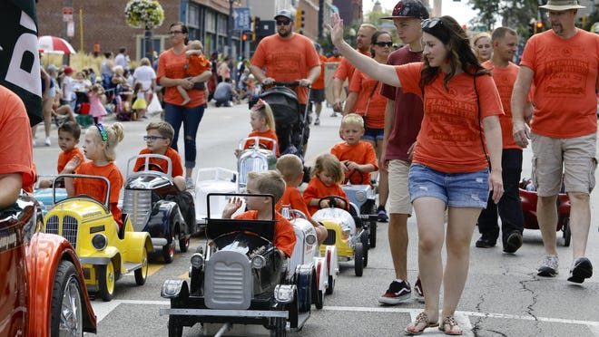 Members of the Plumbers and Pipefitters Local 23 and their families walk in the Labor Day parade Monday, Sept. 2, 2019, in downtown Rockford. The 2020 parade has been canceled because of concerns about the coronavirus pandemic.