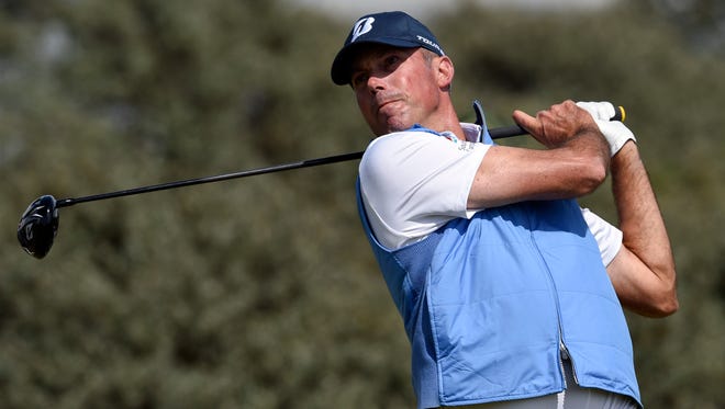 Matt Kuchar plays his shot from the second tee during the final round of The 146th Open Championship golf tournament at Royal Birkdale Golf Club.