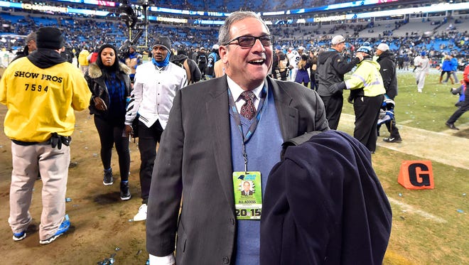 Carolina Panthers general manager Dave Gettleman celebrates after beating the Arizona Cardinals in the NFC Championship football game at Bank of America Stadium.