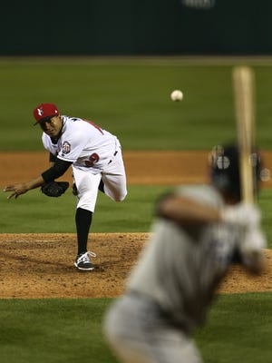 Indianapolis Indians pitcher Kelvin Marte (49) pitches in the seventh inning of the Indianapolis Indians home opener, Victory Field, Indianapolis, Thursday, April 14, 2016.