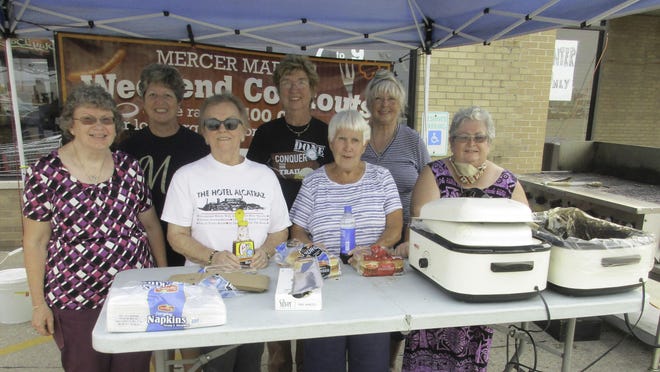 Mercer County Home and Community Education board members gathered at Mercer Market as they were offering pork chops for sale.  In the front row are Donna Pinger, Elene Waters,  Linda Whitney, and Cara Ausmus.  In the back row please find Joan Luxmore, Susan DeBlock, and Judy West. Submitted photo.