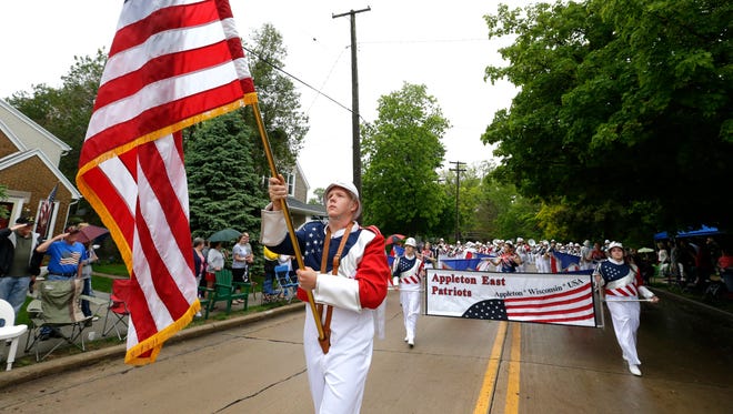 The Appleton East High School marching band participates during last year's Memorial Day Parade in Appleton. For Memorial Day this year, the band will be heading to Washington, D.C.