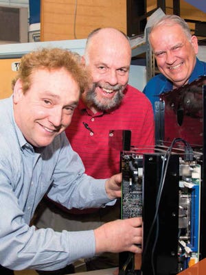 Entrepreneurs Greg Scantlen, left, Chuck Bulow and Paul Saxe are receiving assistance from the state's national labs.
