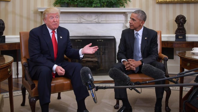 US President Barack Obama meets with Republican President-elect Donald Trump to update him on transition planning in the Oval Office at the White House on November 10, 2016 in Washington,DC.  / AFP / JIM WATSON        (Photo credit should read JIM WATSON/AFP/Getty Images)