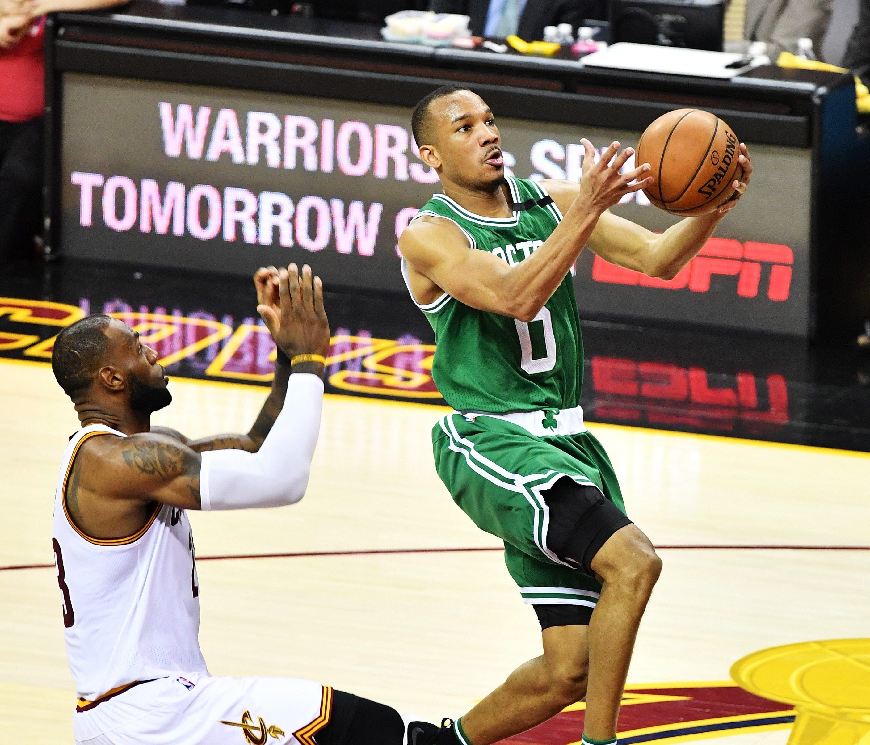 Avery Bradley #0 of the Boston Celtics goes up against LeBron James #23 of the Cleveland Cavaliers in the second half during Game Three of the 2017 NBA Eastern Conference Finals at Quicken Loans Arena on May 21, 2017 in Cleveland, Ohio