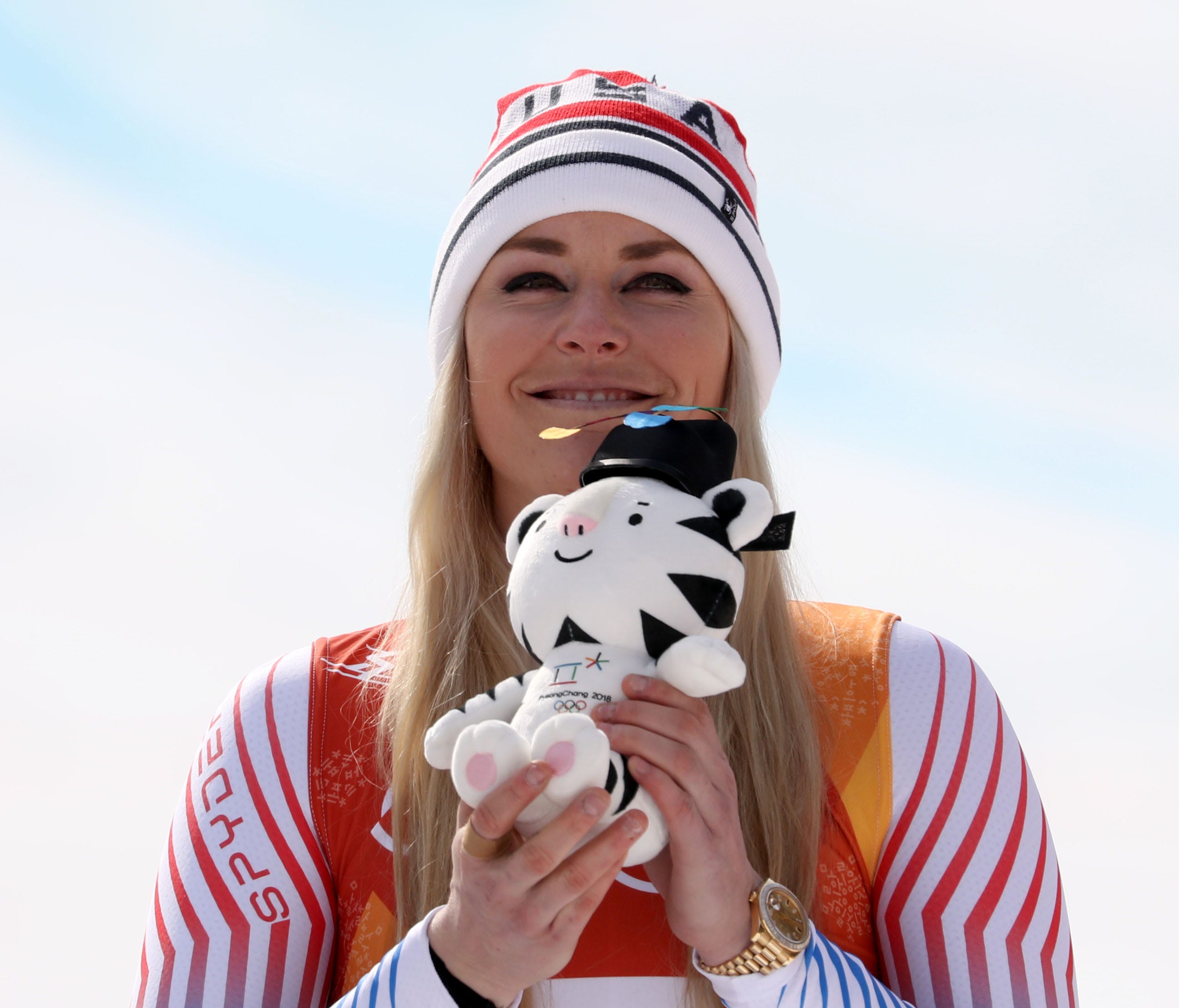 Lindsey Vonn (USA) celebrates winning the bronze medal in the women's downhill.