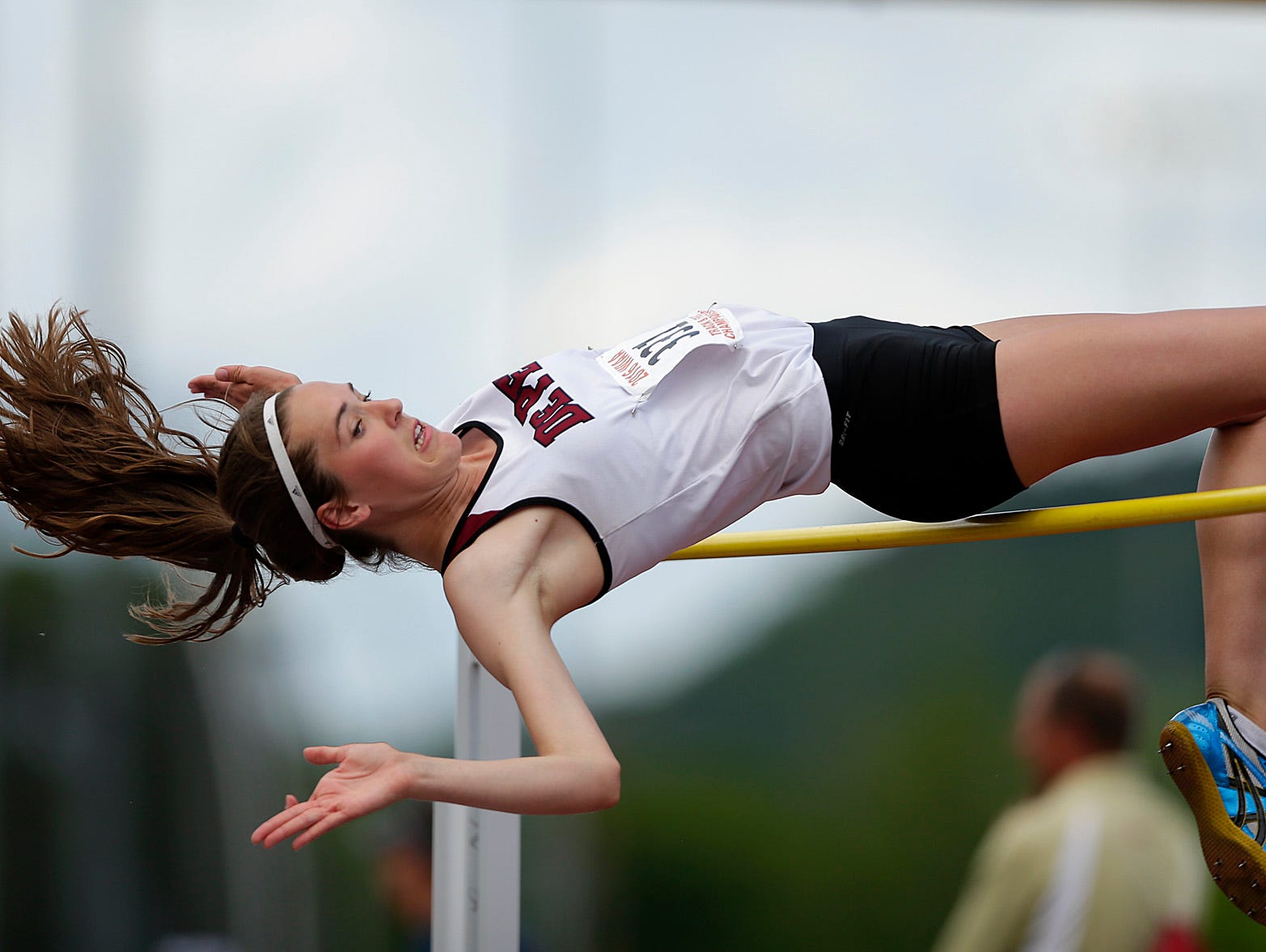De Pere's Lindsey Mirkes clears the bar as she competes in the Division 1 high jump during the WIAA state track and field meet at Veterans Memorial Field Sports Complex in La Crosse on June 4, 2016. Mirkes finished as the D1 state runner-up.