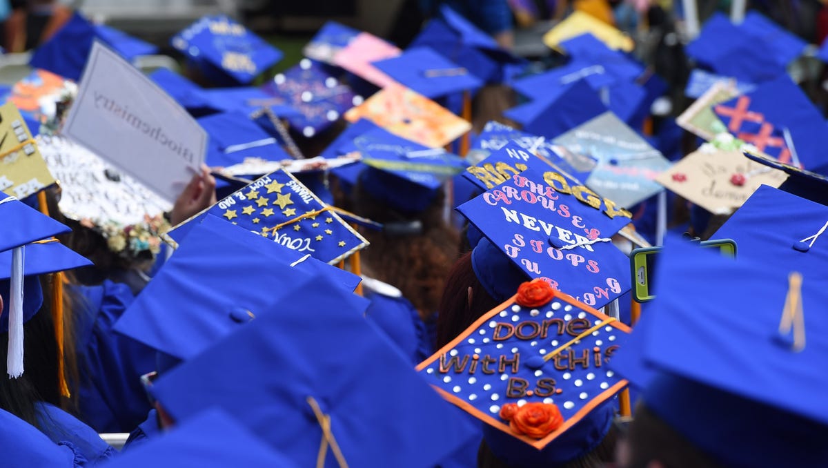 A few of the decorated caps worn by graduating students at SUNY New Paltz's commencement. 