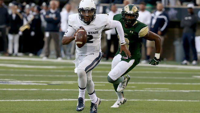 Utah State quarterback Kent Myers ran for 191 yards and a touchdown on 16 carries last year in the Aggies' 33-18 win over the Rams in Logan, Utah.