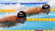 Michael Phelps (USA) and Ryan Lochte (USA) swim during