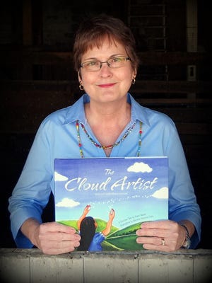 Farmington High School graduate Sherri Maret is the author of "The Cloud Artist," a tale of a Choctaw girl who uses the sky for a canvas.