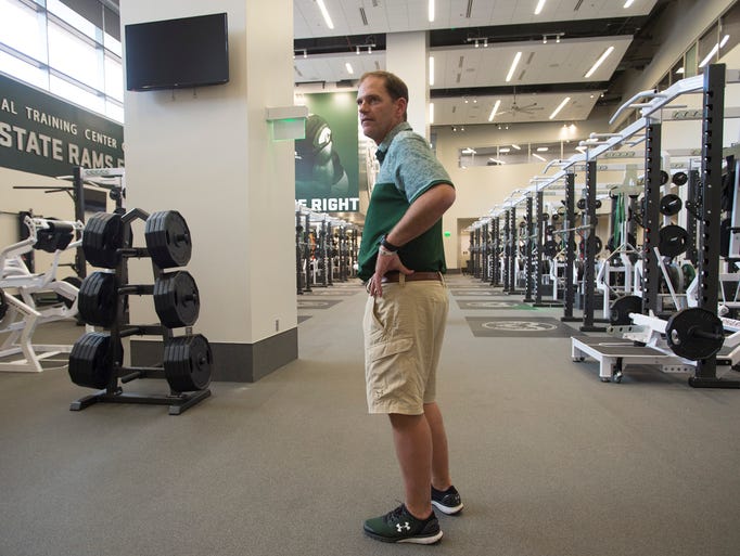 CSU football coach Mike Bobo stands in the weight room