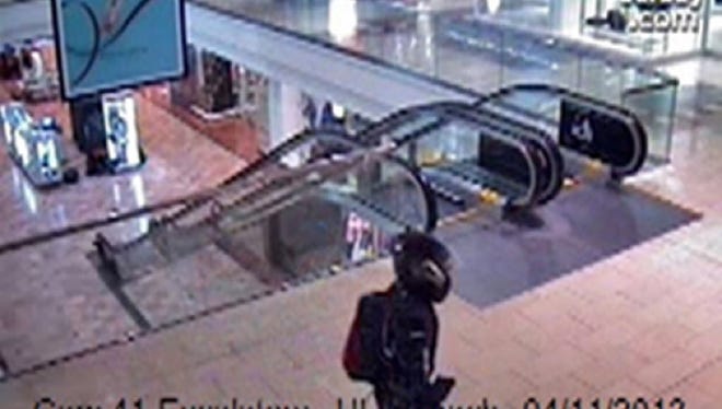 Surveillance cameras caught 20-year-old Richard Shoup carrying a large rifle/weapon and horrifying shoppers and workers around Westfield Garden State Plaza on November 4, 2013.
