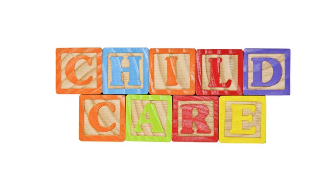 Childrens Alphabet Blocks spelling the words Child Care