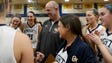 Old Tappan girls basketball coach Brian Dunn is surrounded
