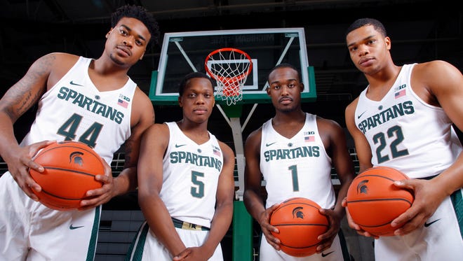 Michigan State freshmen Nick Ward, from left, Cassius Winston, Joshua Langford and Miles Bridges pose during the team's NCAA college basketball media day.
