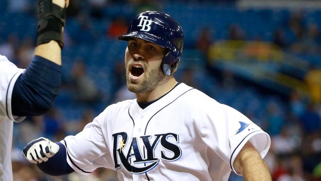 Tampa Bay Rays catcher Curt Casali is congratulated after he hit a two-run home run during the eighth inning against the Detroit Tigers at Tropicana Field.