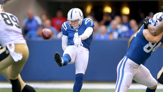 Indianapolis Colts punter Pat McAfee (1) gets a punt away during the first half of an NFL football game Sunday, Oct. 25, 2015, at Lucas Oil Stadium.